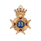 A decorative Masonic emblem with a blue and gold color scheme, featuring a star, a crown at the top, and the number 33 in the centre.
