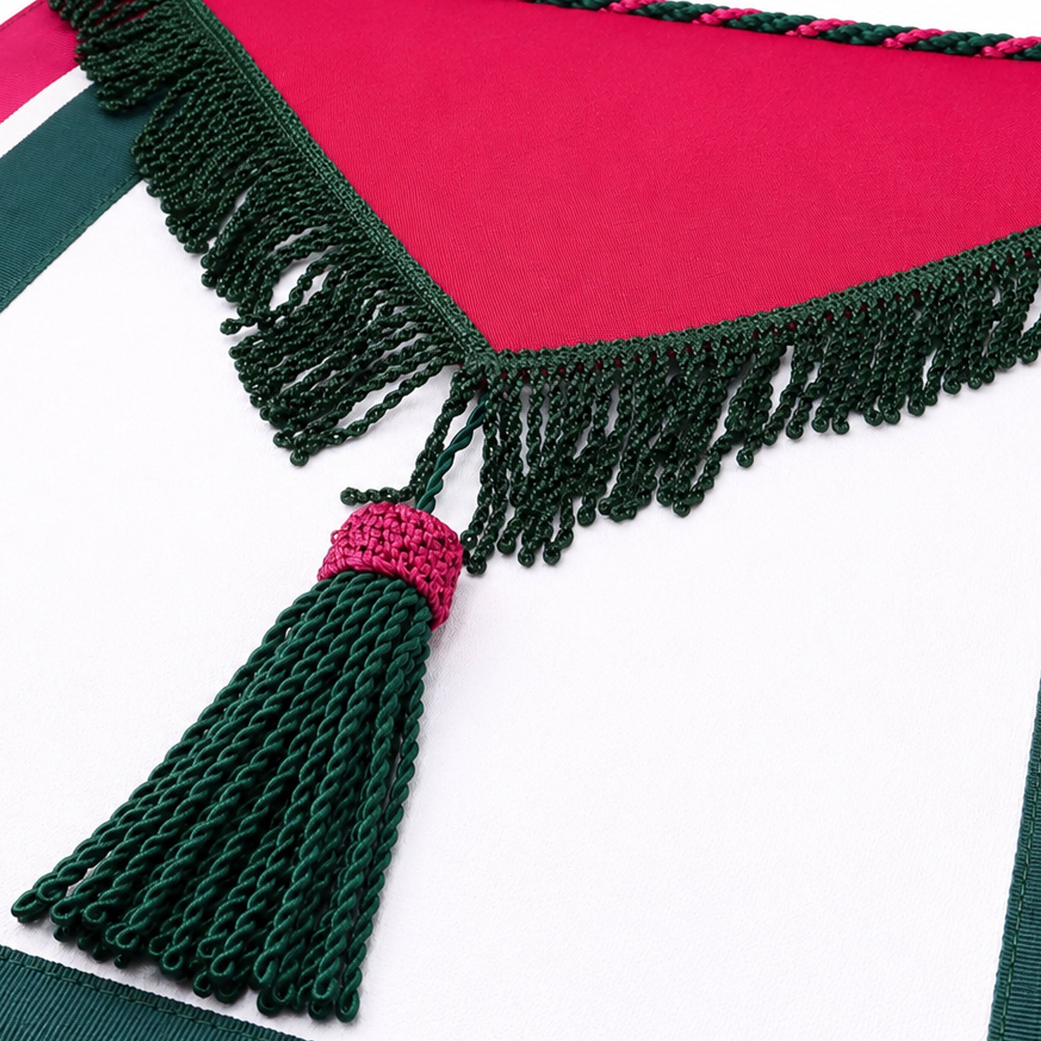 Royal Order of Scotland Masonic apron with red, green and white trim and tassel close up view
