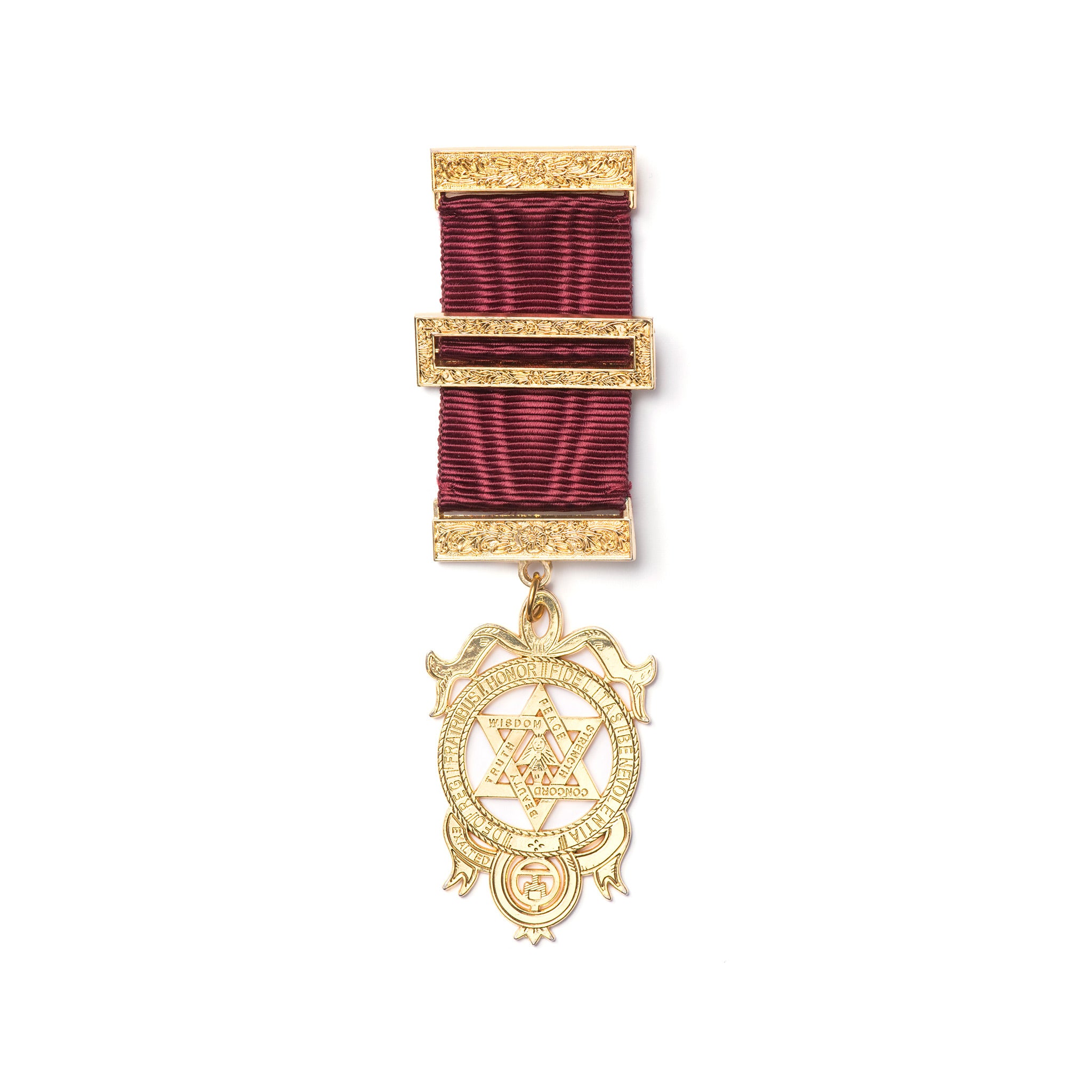 A gold-colored large Masonic breast jewel with a geometric pattern and a red ribbon attachment, displaying a symbolical design.