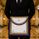 UGLE Official Royal Ark Mariner Commanders Apron, featuring a rainbow-coloured ribbon running along the sides, bottom edge, and flap being modelled