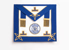 A blue and gold masonic apron with rosettes and a badge in the center.