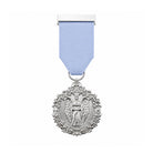 A silver-toned circular medal with an embossed angel figure, suspended from a light blue ribbon with a silver top bar, shown on a plain white background.