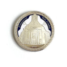 Coin with Freemasons' Hall, London design on a white background