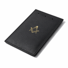 Premium Masonic leather jewel pad laying flat down featuring the Square and Compasses emblem in gold