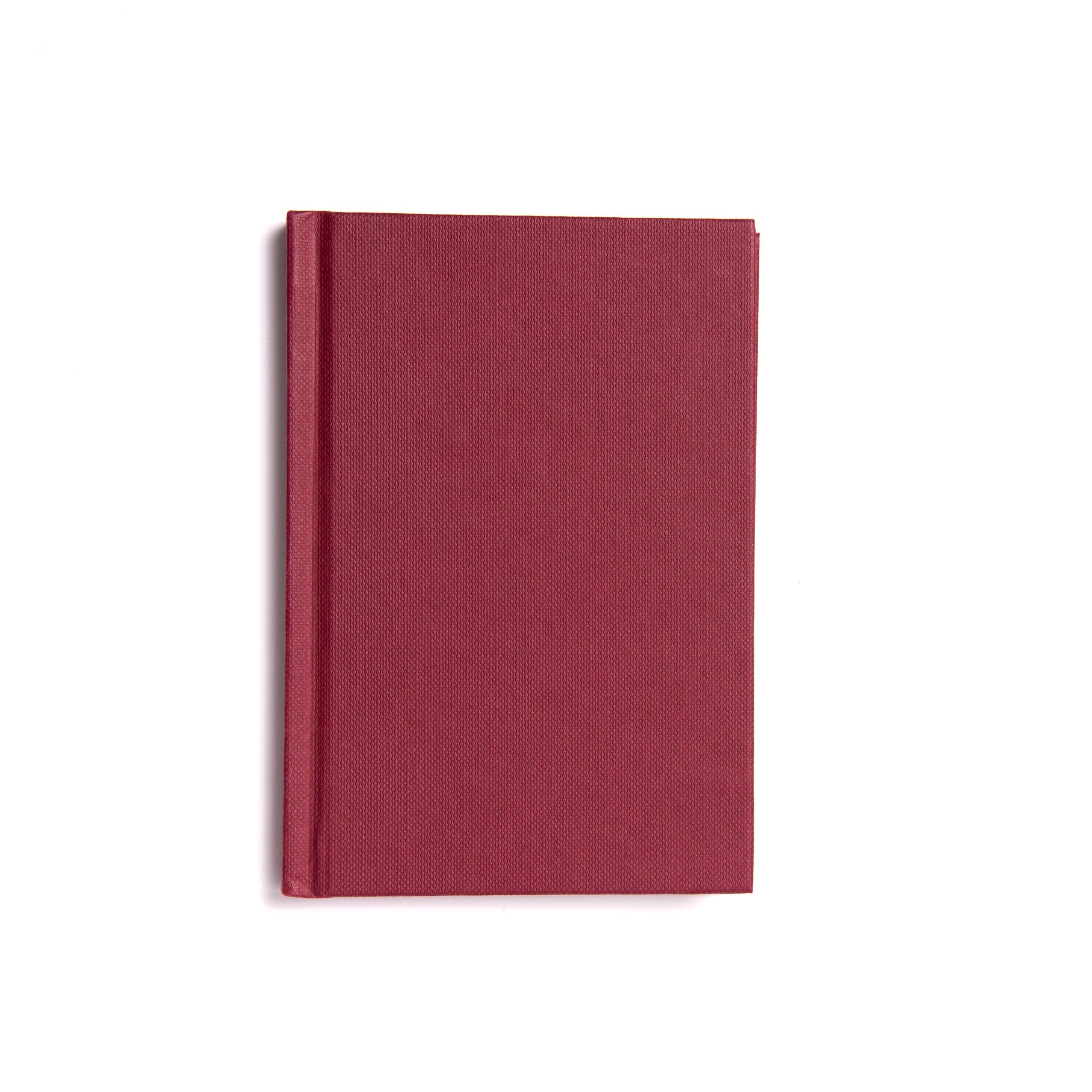 A hardback book with a red cover, presumably containing the Standard Working of the Royal Arch Ritual.