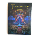 A cover of the book titled 'Tercentenary: Celebrating 300 years of the Premier Grand Lodge' showing an image of a grand ceremony with an audience and stage setup.