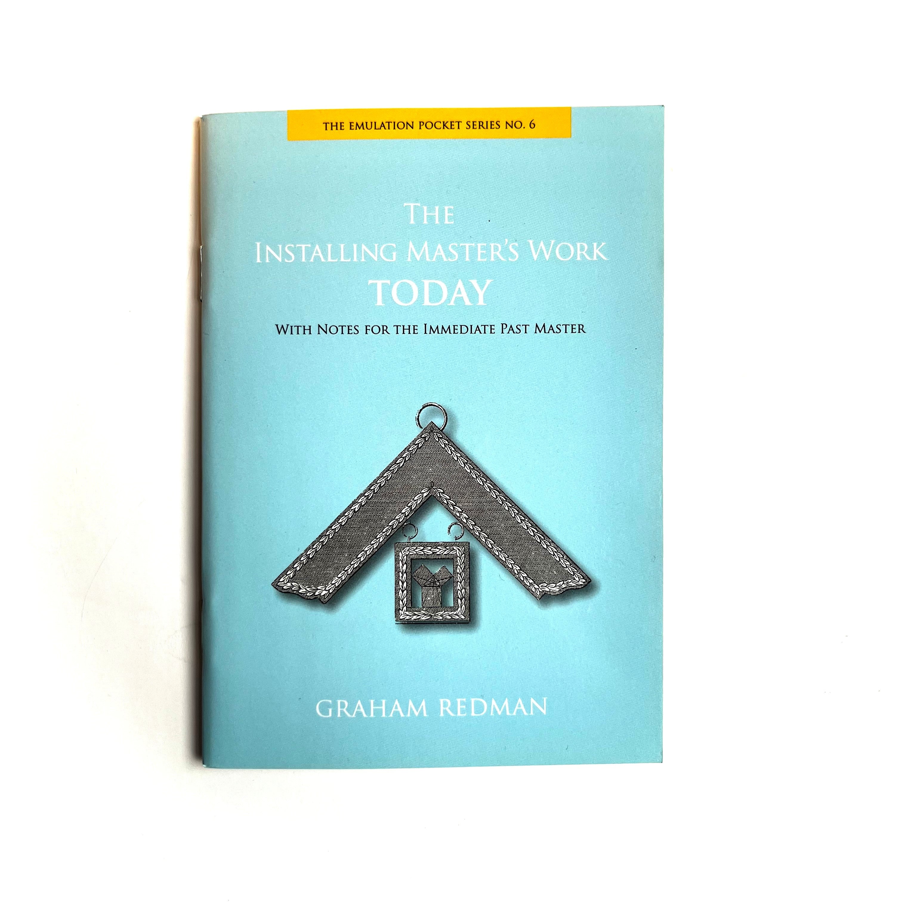 The cover of the book 'The Installing Master's Work Today' by Graham Redmab, featuring a blue background, a Masonic symbol, and text.