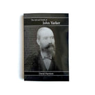 A paperback book with a monochrome photograph of a man with a beard on the cover, titled 'The Life and Death of John Yarker' by David Harrison.