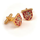 Gold and red UGLE crest cufflinks on a white background