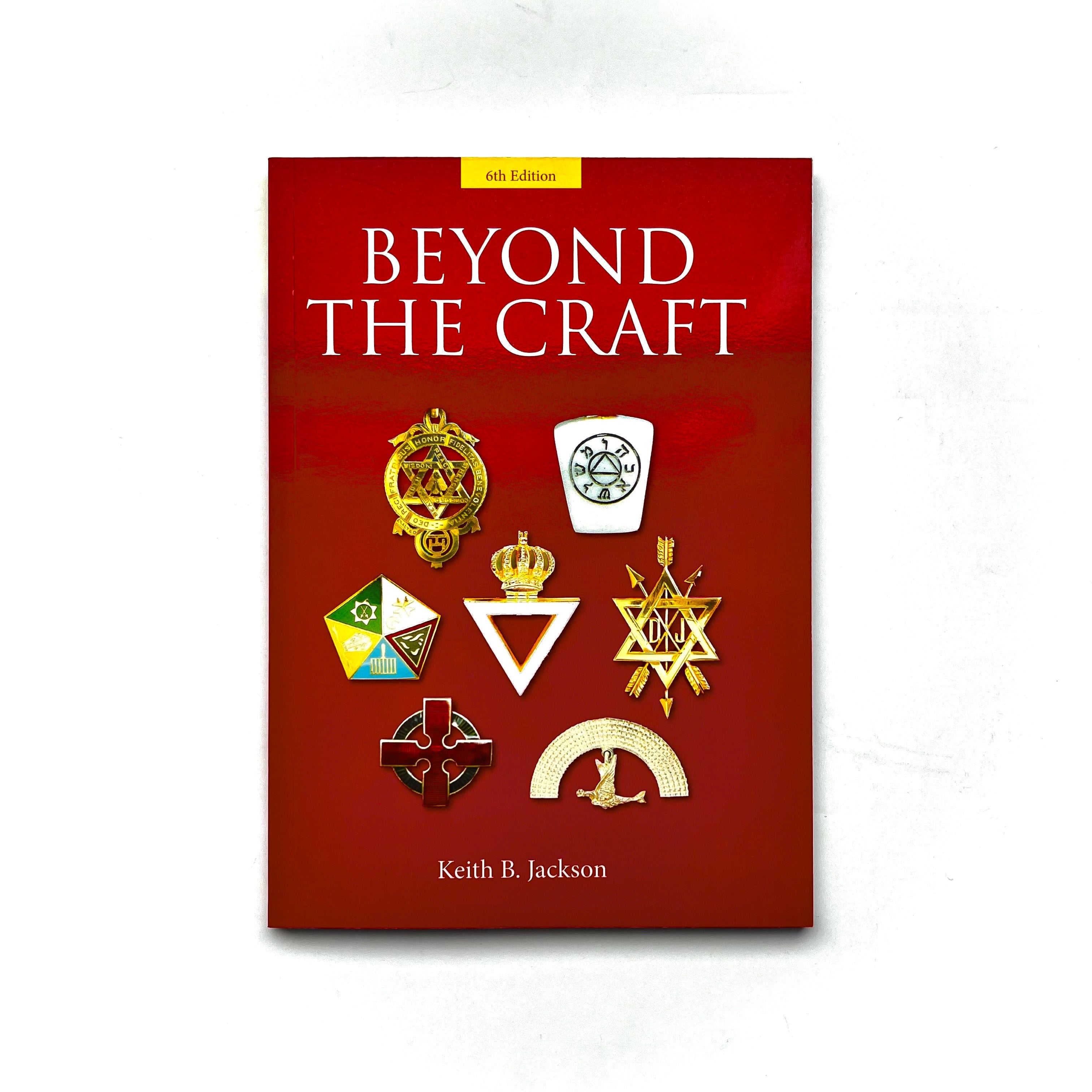 The cover of the book 'Beyond The Craft' featuring a red background with the title and author's name, Keith B. Jackson, along with various Masonic order emblems.